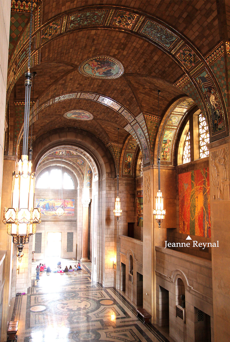 Nebraska State Capitol foyer featuring Hildreth Meière’s mosaics on the floor, arches, and ceiling. In the niche on the right, below the window, is a mosaic designed and installed by Jeanne Reynal.